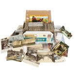 A box of various topographical postcards, a sleeve of book read cards, an album of tea cards etc