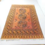 A sienna Turkish rug. 208x136cm.