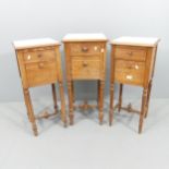 Three similar marble and tile topped pitch pine pot cupboards. Largest 38x84x38cm Three similar,
