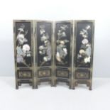 A Chinese black lacquered four fold screen, with painted and applied hardstone decoration. Each