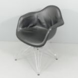 VITRA - a Charles Eames DAR upholstered shell armchair on chrome Eiffel base, with Vitra moulded