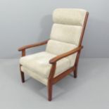 A mid-century Danish style teak and upholstered lounge chair, in the manner of Dyrlund.