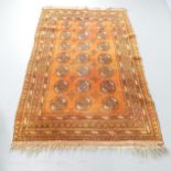 A sienna Persian rug. 188x116cm.