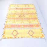 An orange ground Persian Quashqui rug. 202x140cm.
