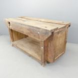 A vintage pine two-tier workbench with end cupboards (lacking vice). 160x79x68cm.