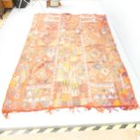A red-ground Kurdish Kilim rug. 257x175cm. Good condition. Appears to be two smaller rugs joined