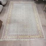 A cream-ground Isfahan design rug. 287x195cm