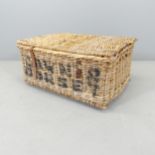 A vintage wicker laundry basket, named Dawn & Dorset. 67x32x55cm.