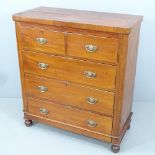 A Victorian satin walnut chest of two short and three long drawers. 108x120x50cm. With key.