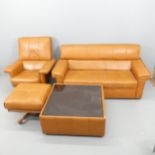 A mid-century brown leather upholstered four-piece lounge suite, comprising a two seater sofa,