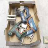 A box containing a Bosch GST97 jigsaw, a Black and Decker D220 hammer drill, a Bosce PSB 24 VE-2 and