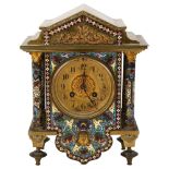 19th century brass and champleve enamel cased architectural mantel clock, the case flanked by 4