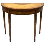 A 19th century satinwood demi-lune fold over card table, with rosewood inlaid top, the base having