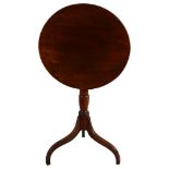 A Georgian circular mahogany tilt-top table, on tripod base, diameter 55cm