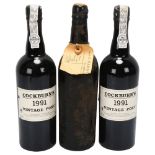 2 bottles of Cockburn's 1991 Vintage Port wine, together with another vintage bottle unmarked with