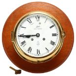 A brass-cased ship's dial wall clock, Schatz Royal Mariner, 8-day striking movement, mounted on