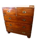 19th century brass-bound military chest of drawers, in 2 parts with brass carrying handles and bun