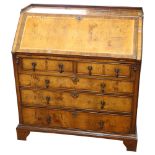 A 19th century pale walnut bureau, with panelled sides, width 94cm, height 101cm