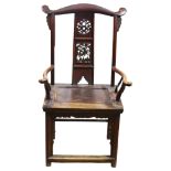 An antique elm Chinese emperor's throne chair, with carved and pierced decoration. Overall