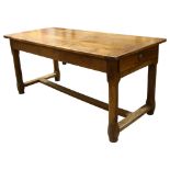 A 19th century Oak refectory table, with single end drawer, chamfered legs and H shaped stretcher,