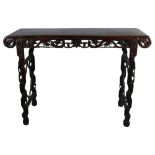 A Chinese 19th century rosewood altar table, with grapevine carved and pierced frieze on carved