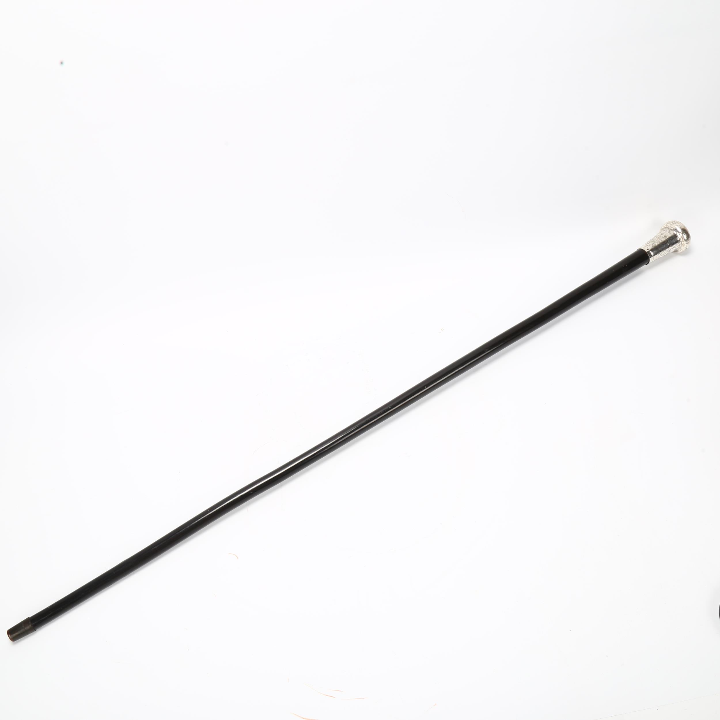 An Ebony walking cane with large hand engraved silver top, hallmarked London 1925/6, length 92cm - Image 2 of 3