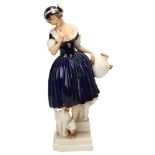 A Royal Dux, Art Deco ceramic group of a woman and cat, makers marks under base, height 32cm Good