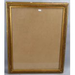 A large 19th century gilt-gesso frame, inside measurement 74cm x 96cm A few tiny chips around the