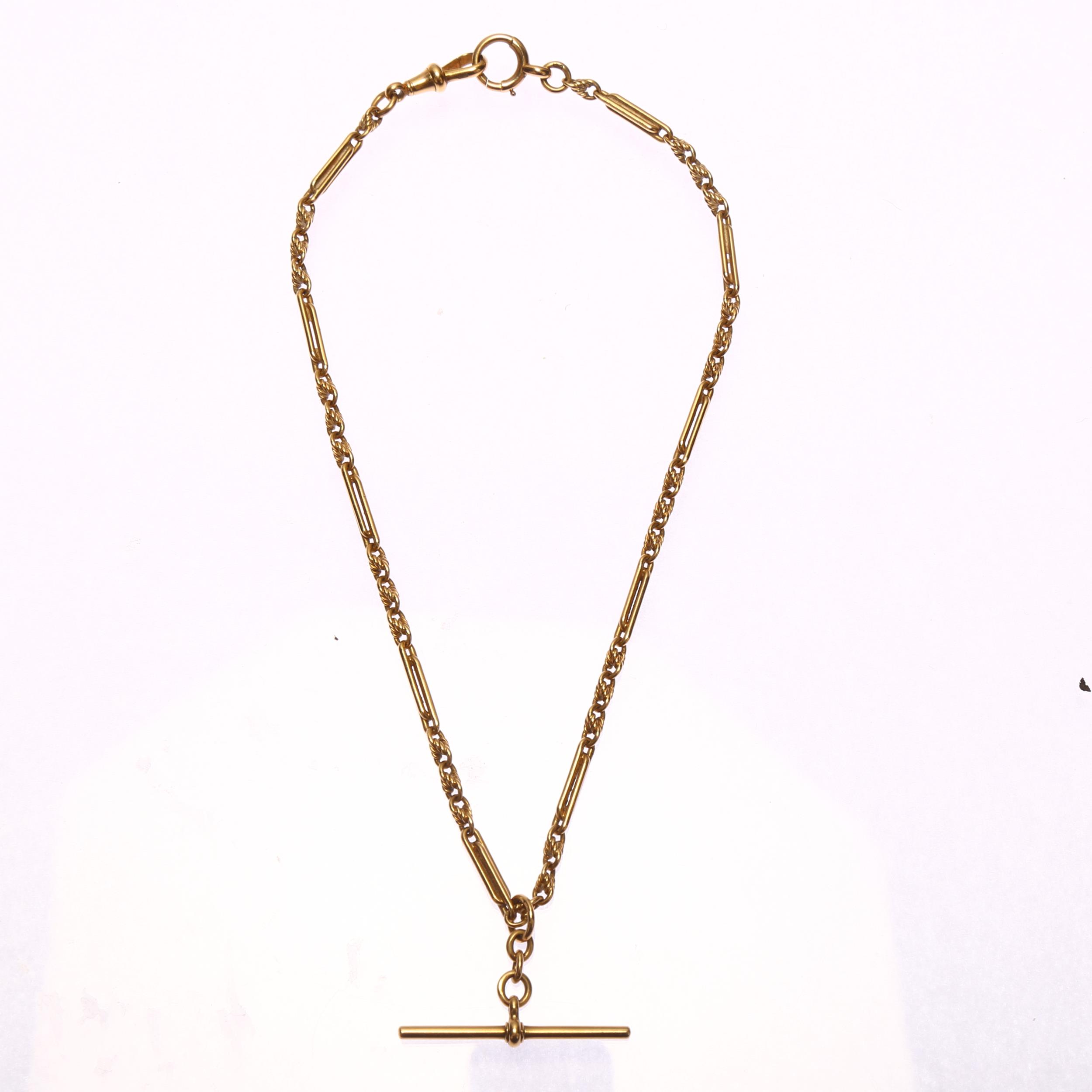 An early 20th century 18ct gold fancy link Albert chain necklace, with 18ct T-bar slider, dog clip - Image 2 of 4