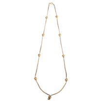 A 9ct gold fancy link chain necklace, with ball spacers, length 66cm, 24g No damage or repair, clasp
