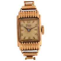 TIMOR - a lady's 9ct gold mechanical wristwatch, textured silvered dial with applied gilt eighthly