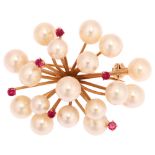 A mid-20th century 14ct gold ruby and cultured pearl abstract brooch, length 36mm, 7.4g No damage or