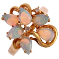An 18ct gold opal and diamond openwork cocktail ring, set with pear cabochon opal and modern round