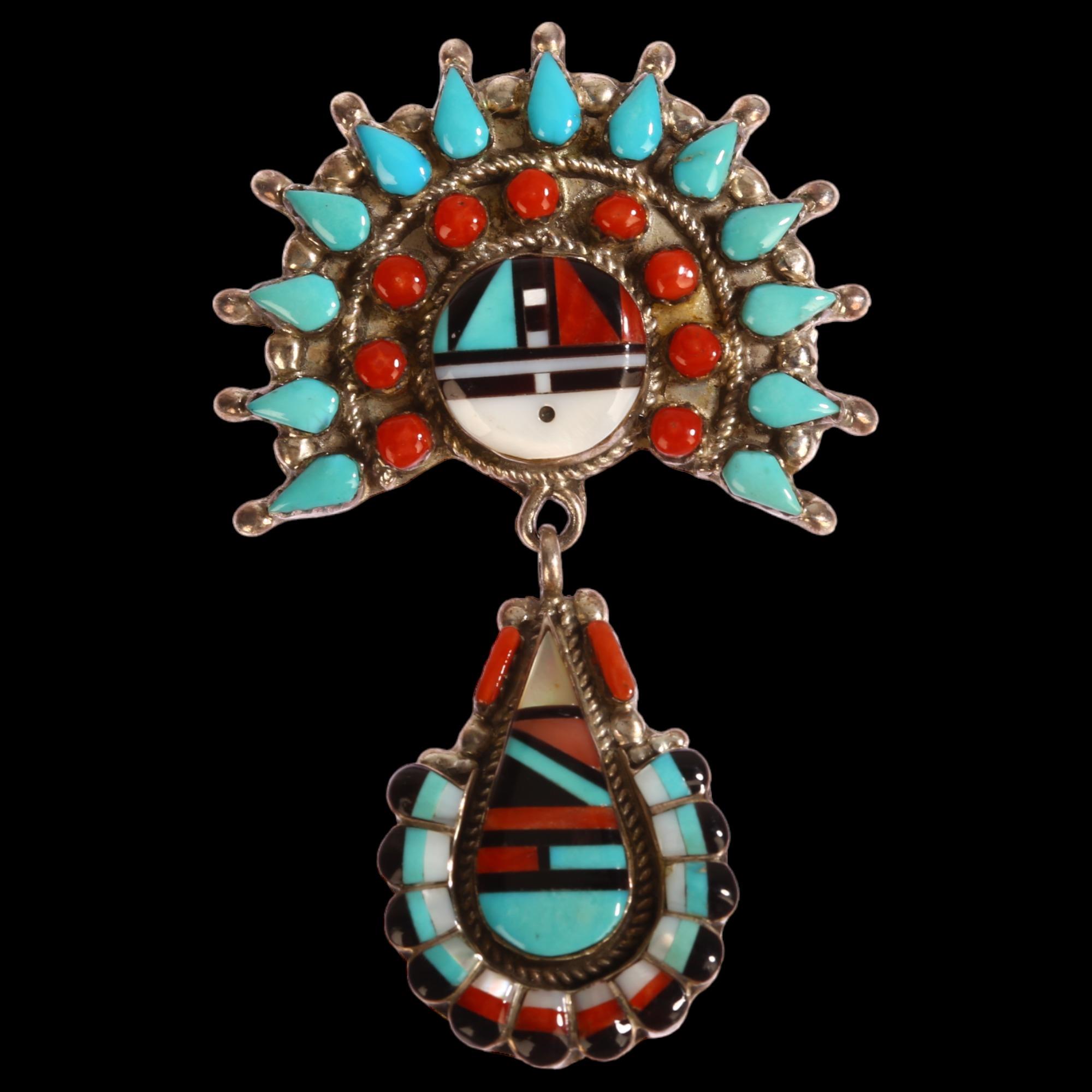 A Native American silver drop pendant brooch, Zuni (Leo Poblano), inlaid with jet coral mother-of-