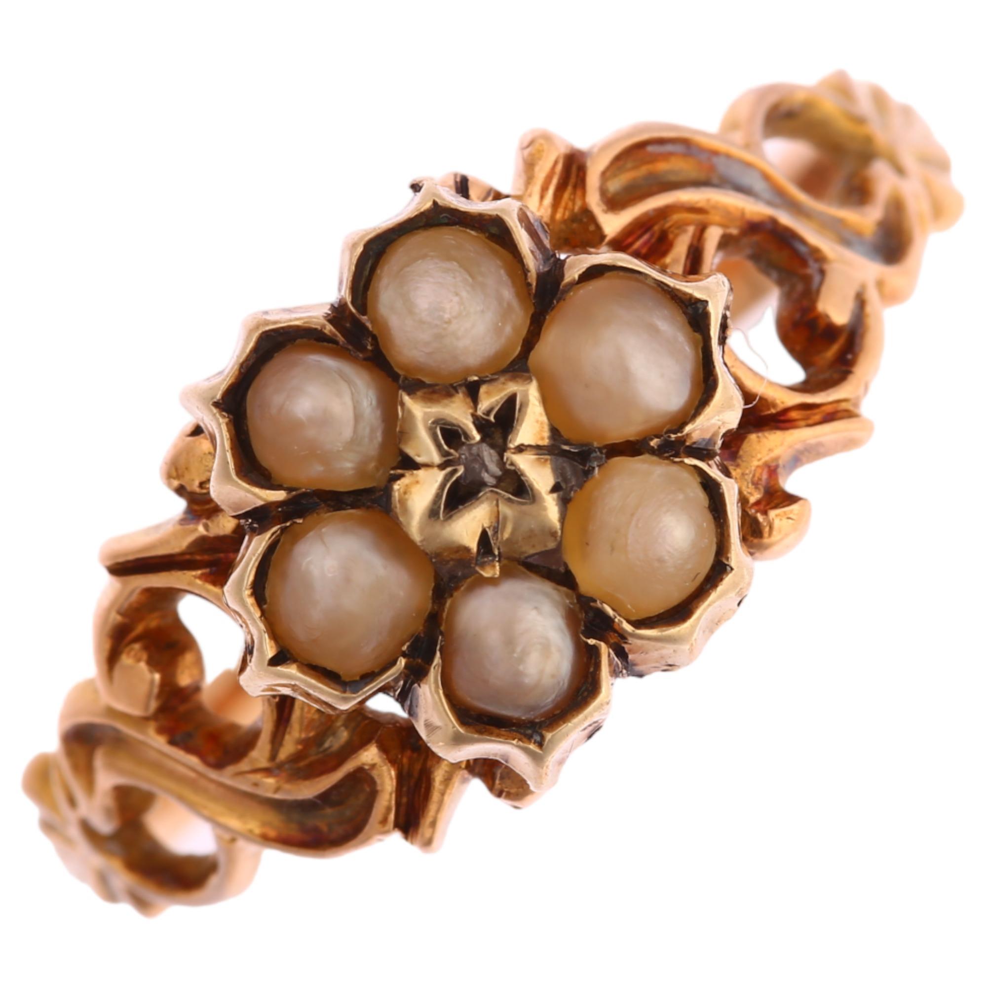 A 19th century diamond and split pearl mourning ring, unmarked gold settings with central flowerhead