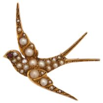 An Edwardian pearl and ruby swallow bird brooch, circa 1905, unmarked gold settings, wingspan 41.
