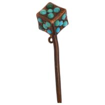 A Victorian turquoise dice stickpin, unmarked yellow metal settings with round cabochon turquoise,