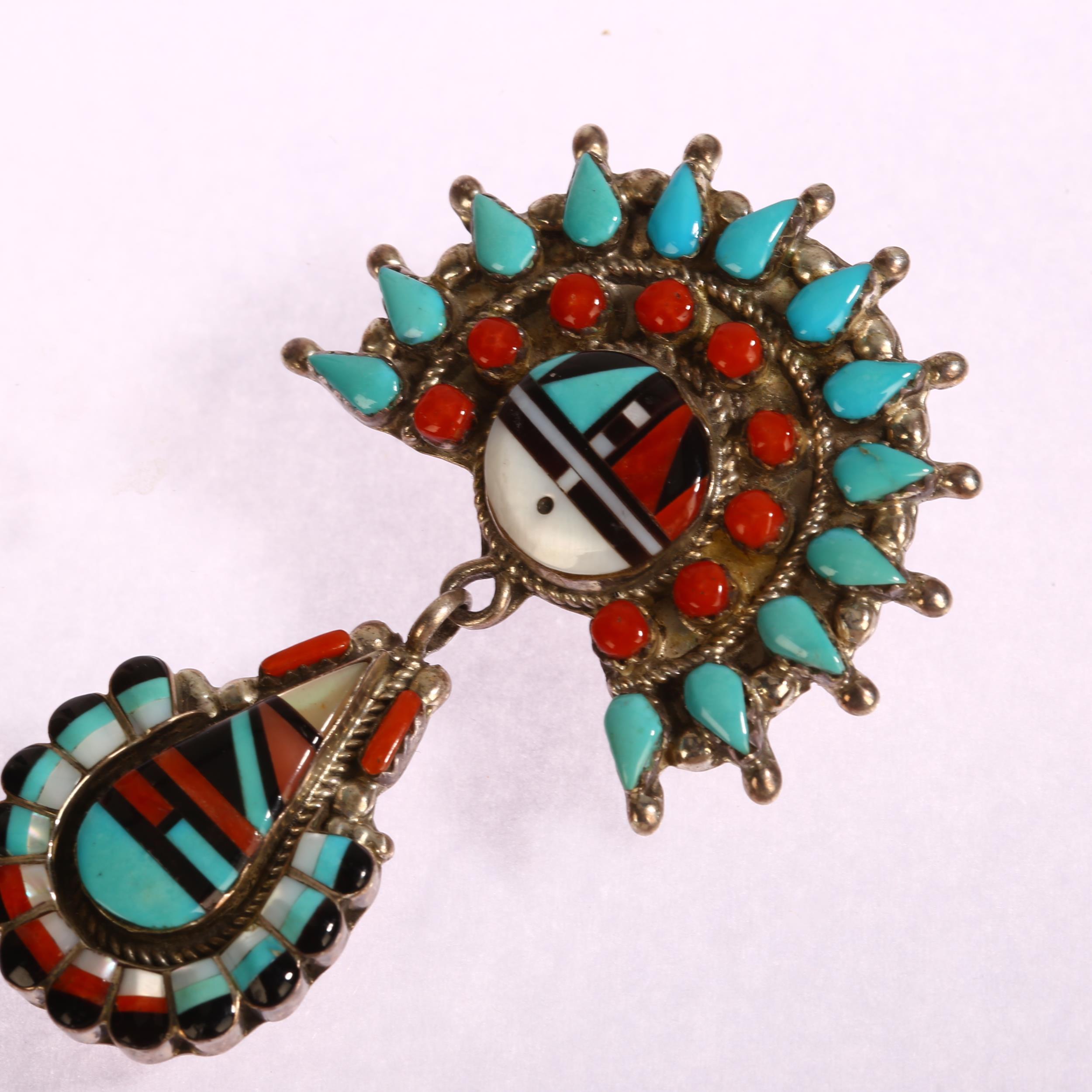 A Native American silver drop pendant brooch, Zuni (Leo Poblano), inlaid with jet coral mother-of- - Image 3 of 3