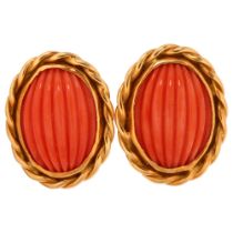 A pair of late 20th century 18ct gold coral earrings, maker's mark SUE, London 1980, set with rib-