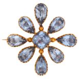 A Victorian 9ct gold blue paste quatrefoil brooch, with closed back settings, width 37.6mm, 9.1g 1
