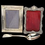 An embossed silver-fronted photo frame, circa 1900, height 18cm, indistinct hallmarks, a modern
