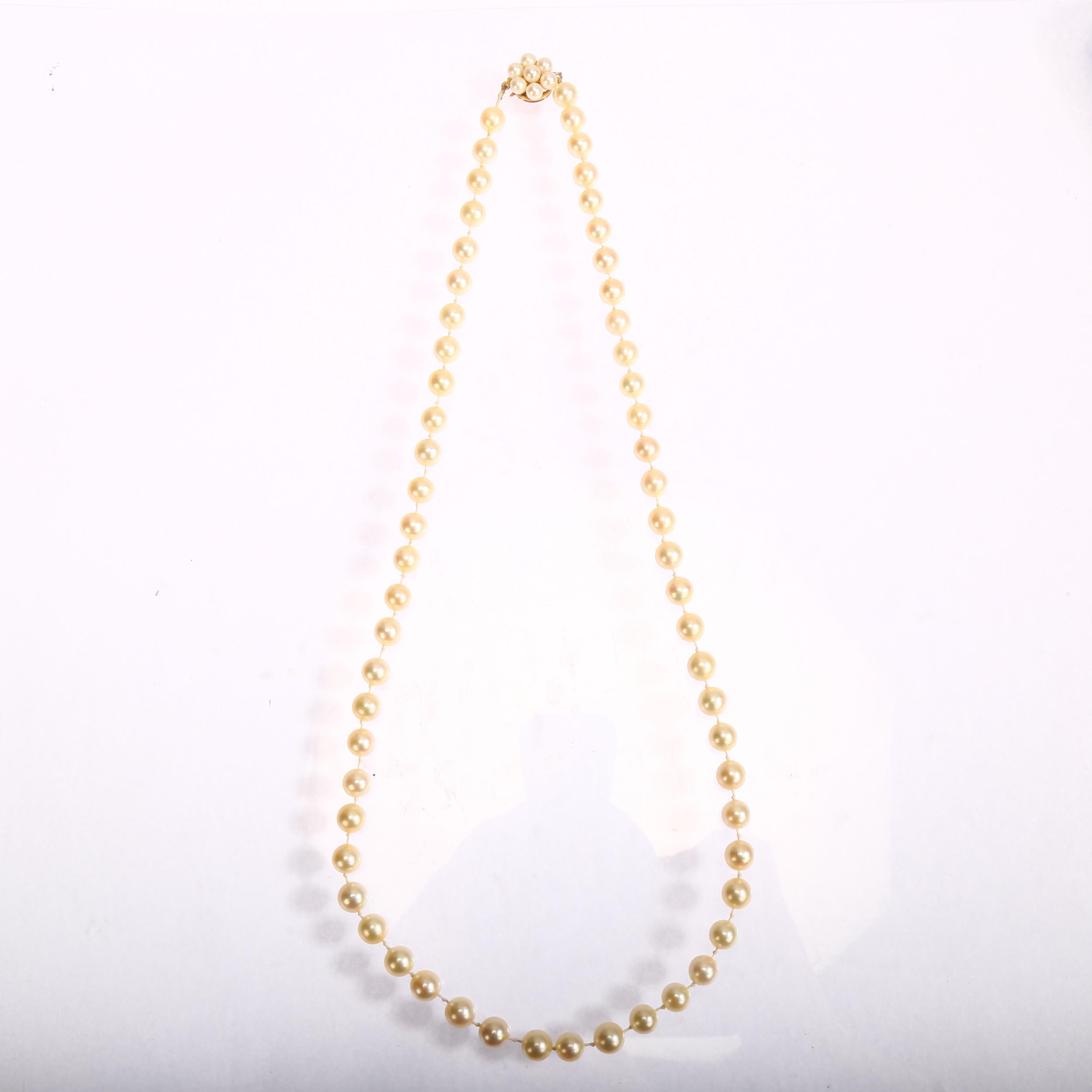 A single-strand cultured pearl bead necklace, with 9ct pearl flowerhead cluster clasp, length - Image 2 of 3
