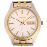 SEIKO - a gold plated stainless steel Day/Date quartz bracelet watch, ref. 7N43-0BF0, white dial