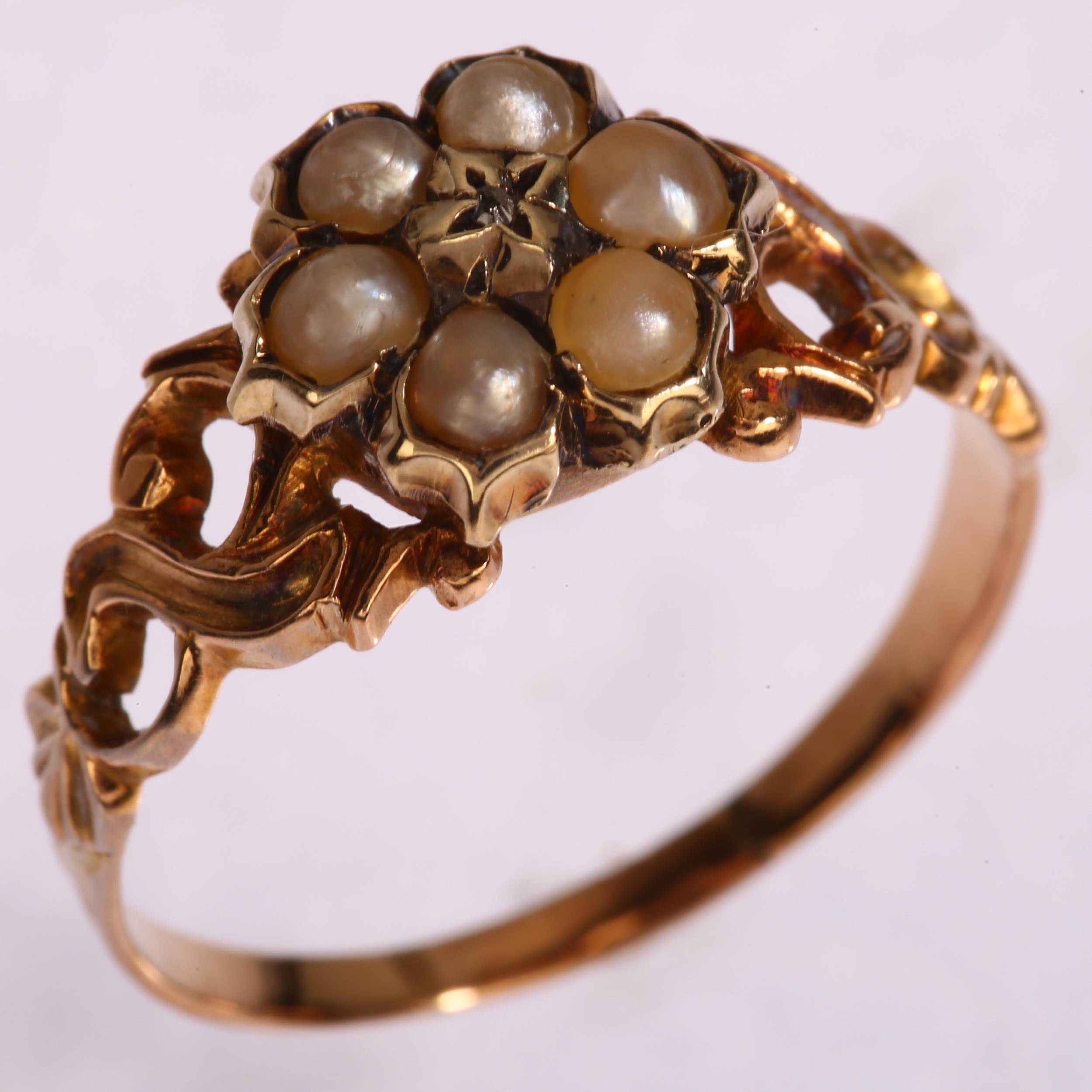A 19th century diamond and split pearl mourning ring, unmarked gold settings with central flowerhead - Image 2 of 3