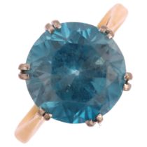 An early 20th century 18ct gold solitaire blue zircon ring, set with 6.4ct round brilliant-cut