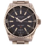 GUCCI - a stainless steel Dive quartz bracelet watch, ref. 136.3, circa 2018, black dial with