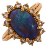 A modern 18ct gold black opal and diamond oval cluster ring, set with oval cabochon opal and