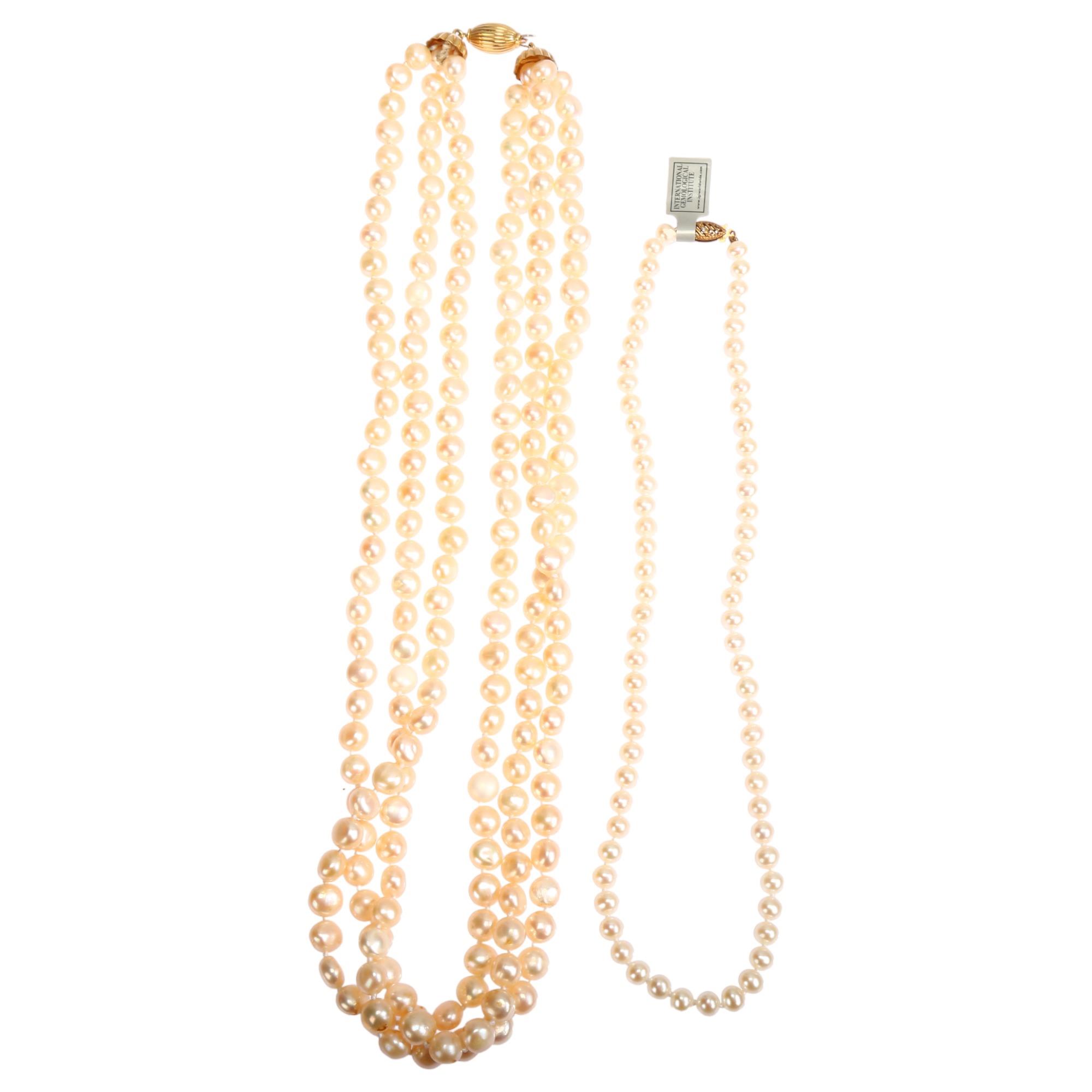 A triple-strand cultured pearl bead necklace, with 18ct barrel clasp, length 50cm, and a single-