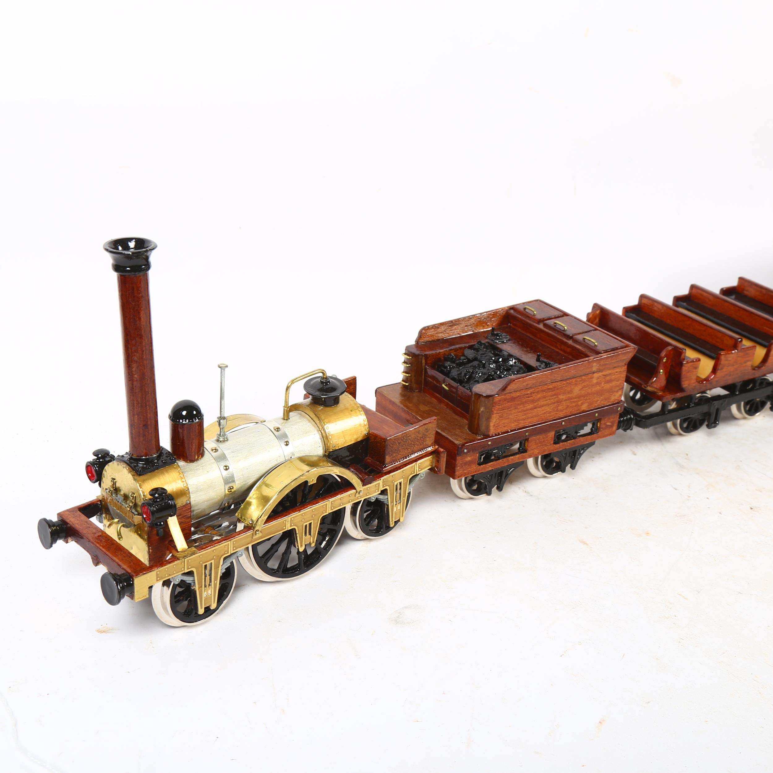A handmade wooden model of the Adler locomotive, with tender and passenger carriages, overall length - Image 2 of 2