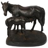 A mid-century cast-iron horse and foal group, with Russian foundry stamp and signed to the base,